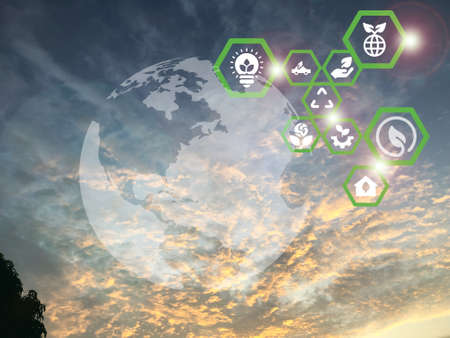 Beautiful sky with ecology and environment conservation symbols. Eco green concept.の写真素材