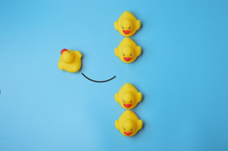 Toy duck walking to different way. individuality and different creative idea conceptの写真素材