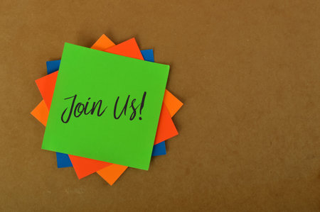 Colorful paper written with JOIN US!