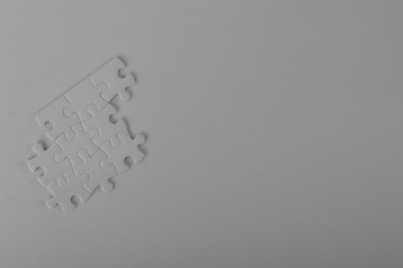 A blank puzzle piece with copy space for the text. Black and white puzzles.の写真素材