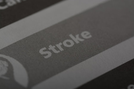 Close up view of the word STROKE. A stroke, also known as a cerebrovascular accident (CVA), is a medical emergency that occurs when there is a sudden interruption of blood flow to the brainの写真素材