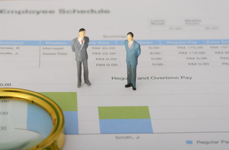 The businessman closely analyzed the sales graph to identify growth opportunities and make informed business decisionsの写真素材