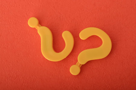 The question mark symbolizes the curiosity and inquiry essential in the business world, prompting...