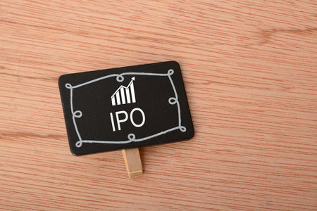 IPO stands for Initial Public Offering. It is the process by which a private company offers its shares to the public for the first time, allowing the company to raise capital from external investors by selling ownership stakesの写真素材