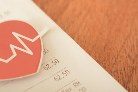 Heartbeat heart and medical bills and receipts provide a detailed account of healthcare expenses, shedding light on the true cost of medical careの写真素材