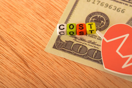 A medical bill cost to pay for essential medicines and treatments arrived in the mail, necessitating a careful review of the charges before processing the paymentの写真素材