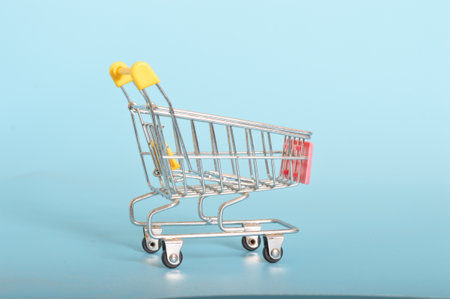 supermarket trolley stands as a symbol of consumer autonomy and choice, ready to be filled with...
