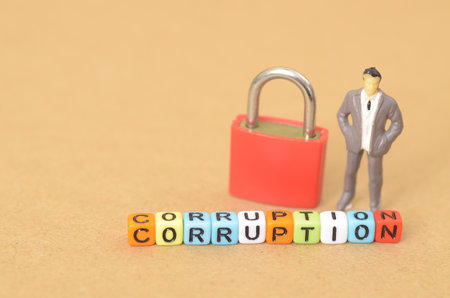 Corruption is the abuse of power for personal gain, involving dishonest or unethical behavior, such as bribery, fraud, or embezzlement, which undermines trust and the integrity of institutions.の写真素材