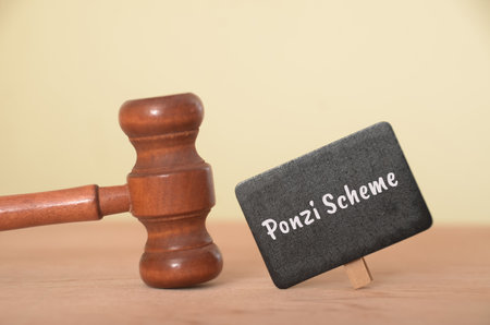 A Ponzi scheme is a fraudulent investment operation that promises high returns to investors through the money of new investors rather than legitimate business activities.の写真素材