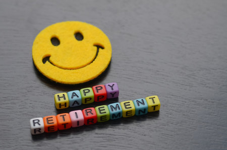 The cheerful smiley face and beaded words HAPPY RETIREMENT convey a message of joy and anticipation...