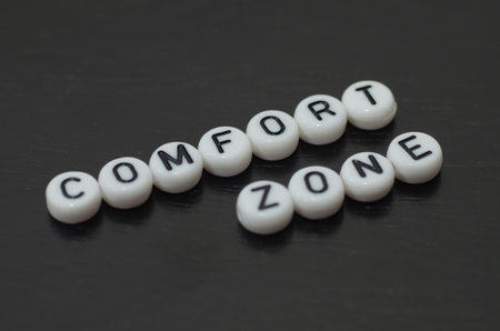 The beads spelling COMFORT ZONE symbolize the familiar and safe place where we often reside.