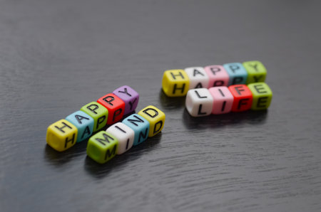 The colorful beaded words HAPPY MIND HAPPY LIFE convey a powerful message about the