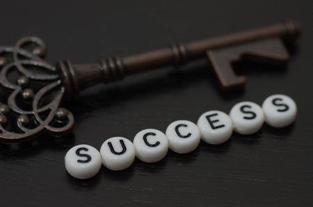 the beaded word "SUCCESS," symbolizes the unlocking of potential and the pursuit of personal achievement.の写真素材