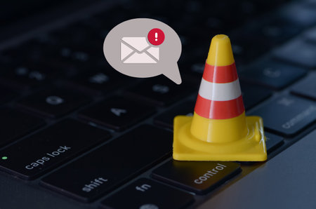 The image conveys a sense of caution and the need for vigilance in managing email accounts, highlighting the importance of protecting against scams, phishing attacks, and other online threats.の写真素材