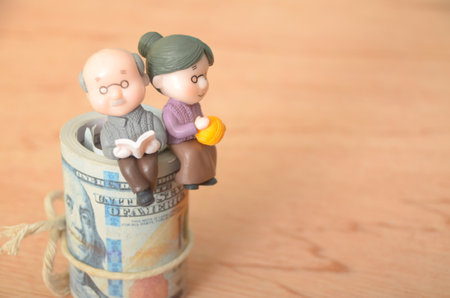 The image symbolizes the importance of financial planning and saving for retirement, ensuring a comfortable and fulfilling later life.の写真素材