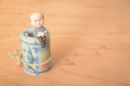 The image symbolizes the importance of financial planning and saving for retirement, ensuring a comfortable and fulfilling later life.の写真素材