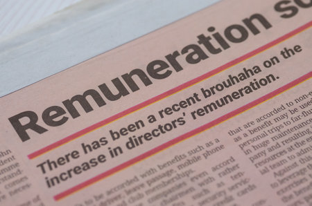 the ongoing discussion and controversy surrounding the remuneration of corporate directors, particularly the issue of excessive pay packages.の写真素材