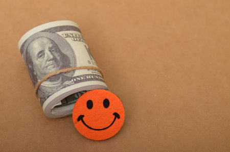 The image represents the positive emotions and satisfaction associated with financial stability and success.の写真素材