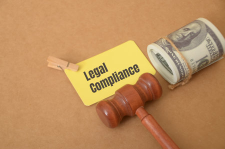 Legal compliance refers to the act of adhering to all applicable laws and regulations within a specific jurisdiction. It involves understanding, interpreting, and following legal requirementsの写真素材