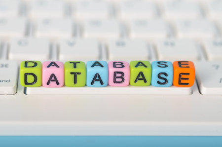 the letter blocks in a linear sequence suggests the organized nature of databases and their ability to retrieve information quickly and efficiently.の写真素材