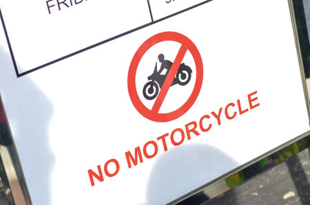 The sign is likely posted in a parking lot or other public area where motorcycles are not allowed.の写真素材