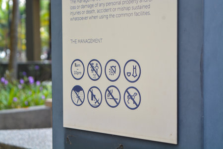 The sign outlines specific restrictions, including no swimming, fishing, or bringing pets.の写真素材