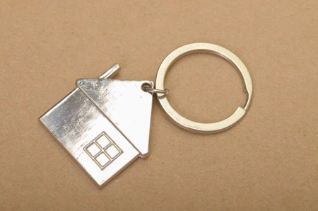 Home Keychain Symbolizing Property Ownership, New Home, and Familyの写真素材