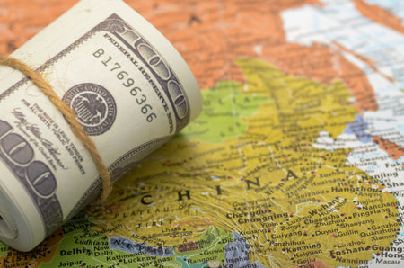 Economic and Financial Growth Concept with Money Banknotes and China Map Highlighting Trade and...