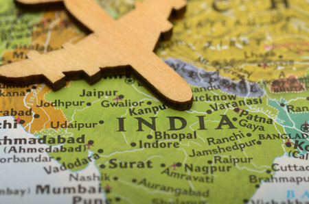 Exploring India: Miniature Airplane and Map Depicting Travel, Tourism, and Adventure Across the Subcontinentの写真素材