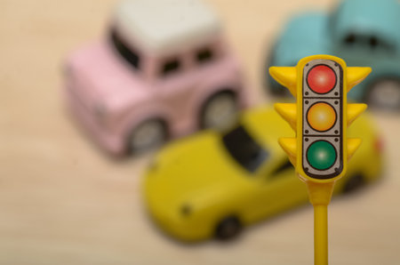 Speeding Car, Traffic Light, and Handcuffs: A Scene of Law Enforcement in Actionの写真素材