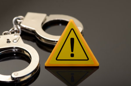 Crime Scene Warning Sign with Handcuffs - Law Enforcement and Justice Concept