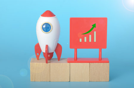 ocket Toy and Upward Graph Sign: Symbolizing Growth and Success