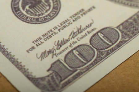 Close-Up of $100 Bill: Detailed Engraving and Typography