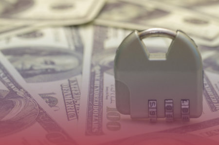 Financial Protection Concept: Combination Lock and US Currency