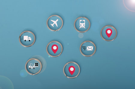 Global Logistics and Transportation Icons on Light Blue Backgroundの写真素材