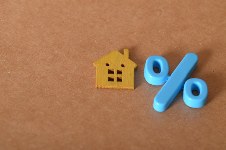Mortgage and Home Financing Concept with Percentage Symbol and Houseの写真素材
