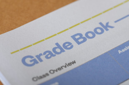 Close-Up of a Grade Book with Class Overview in an Academic Settingの写真素材