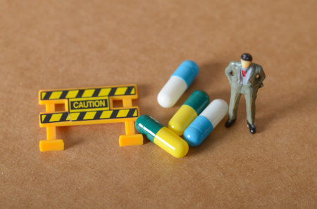 Caution and Consequences: A Symbolic Warning About Medication Risksの写真素材