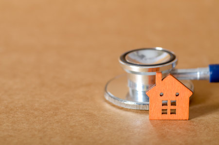 Property Inspection Concept with Stethoscope and House Cutoutの写真素材