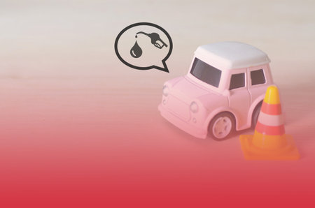 Small Toy Car Signaling Oil Leak or Refueling Need