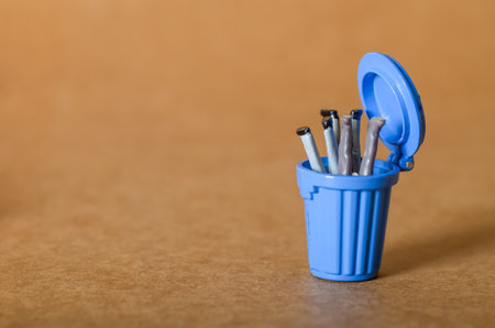 Open Trash Can Lid as Metaphor for Business Failure and Poor Risk Managementの写真素材