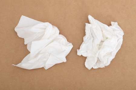 Pair of Discarded Tissue Papers â Everyday Waste on Plain Backdropの写真素材