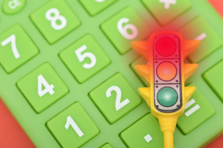 Red Alert on Calculator: Symbolizing Financial Risk and Calculation Warning