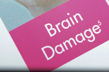 Close-Up of â€œBrain Damageâ€ Text Signifying Serious Neurological Disorder
