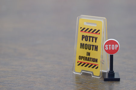 Red STOP Sign with Humorous Potty Mouth in Operation Warning