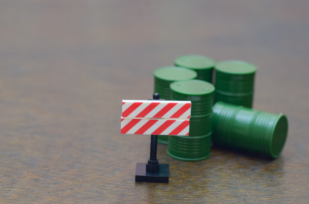Industrial Warning Scene with Hazard Sign and Toxic Material Barrels