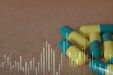 A financial graph with scattered pill capsules visually represents the rising costs of...