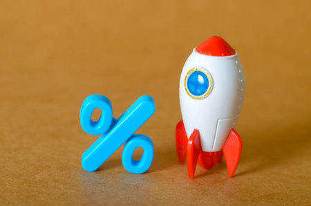 This conceptual image visualizes a dramatic rise in value, representing a successful startup, a...