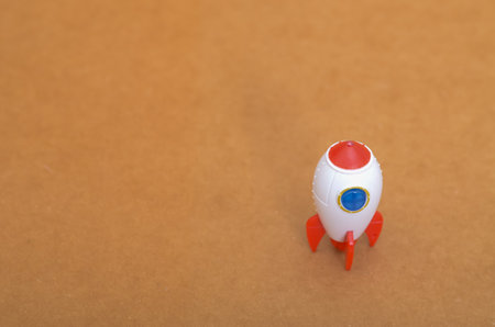 This conceptual image of a toy rocket evokes themes of exploration, innovation, and the first step in a great mission.の写真素材