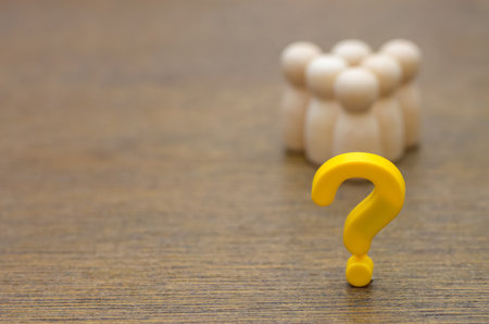 This conceptual image represents a group united by a common problem, highlighting the power of a single question to guide a team.の写真素材